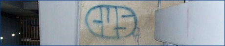 Vecchia scritta ''Cus'' sui muri del settore ospiti dell'Arena Garibaldi di Pisa